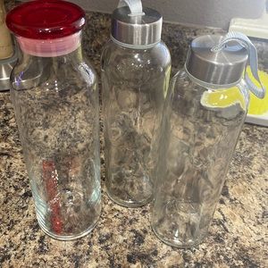 3 Glass bottles with lids